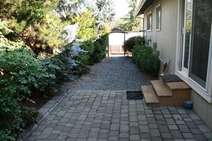 paver patio and gravel side yard for quick drainage