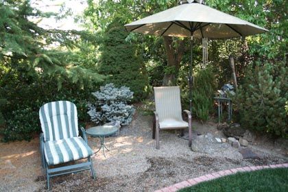 garden seating area with quick draining surface material